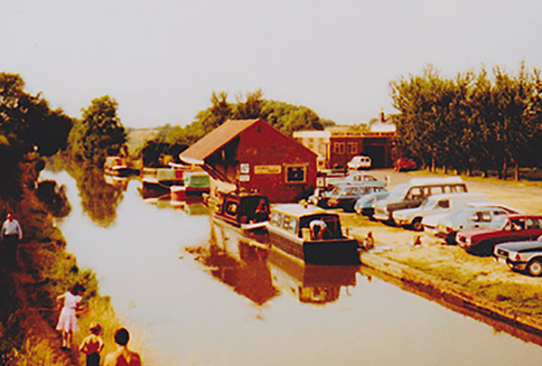 Aynho Wharf showing the canal side shop and the workshop in the background